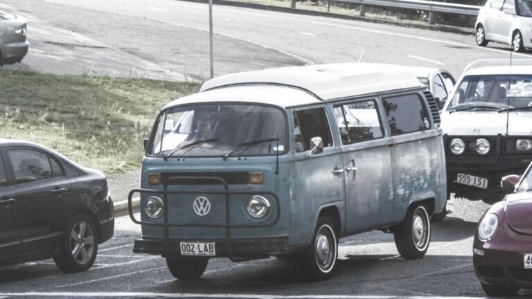 Vans parked on a street